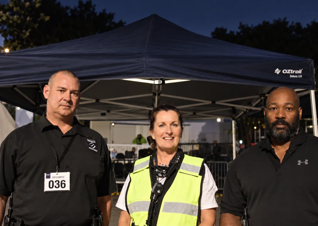 U-Nome Security team in high-visibility vests at an outdoor event